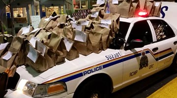 Surrey residents generously help "Pack the Police Car" 