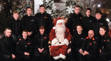 Photo of the RCMP Venturers and Rovers with Santa last year.