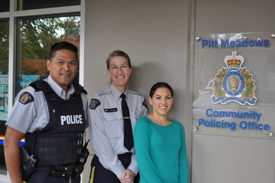 Photo of Corporal Guerro, Constable Doncaster, and front counter person Nicole.