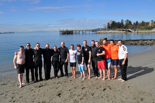 Members from the North Vancouver RCMP, West Vancouver Police and North Shore Rescue pose with Special Olympics BC athletes during the 2023 Polar Plunge in West Vancouver.